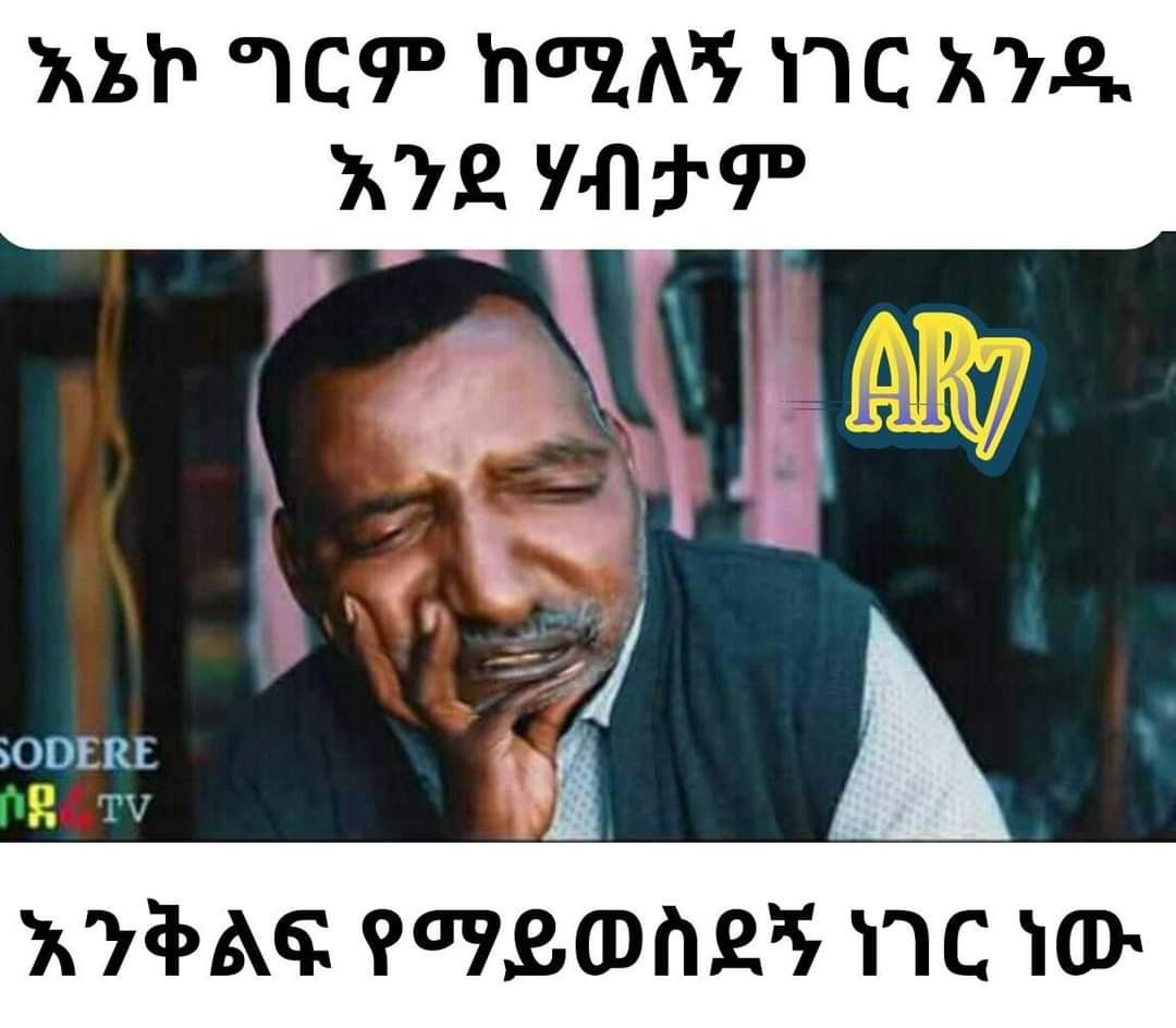 a man with a mustache and a black shirt